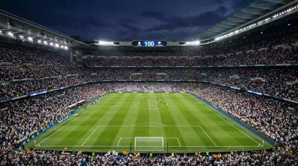 Estadio de fútbol inglés lleno con marcador iluminado mostrando un récord histórico